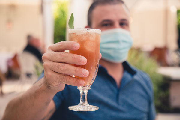 COVID 19 Pandemic Bartender At Wedding Drinks