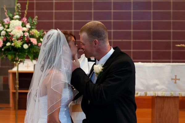 Husband Wife Recessional Kiss