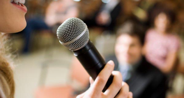 Speaking On Mic With A Professional Voice